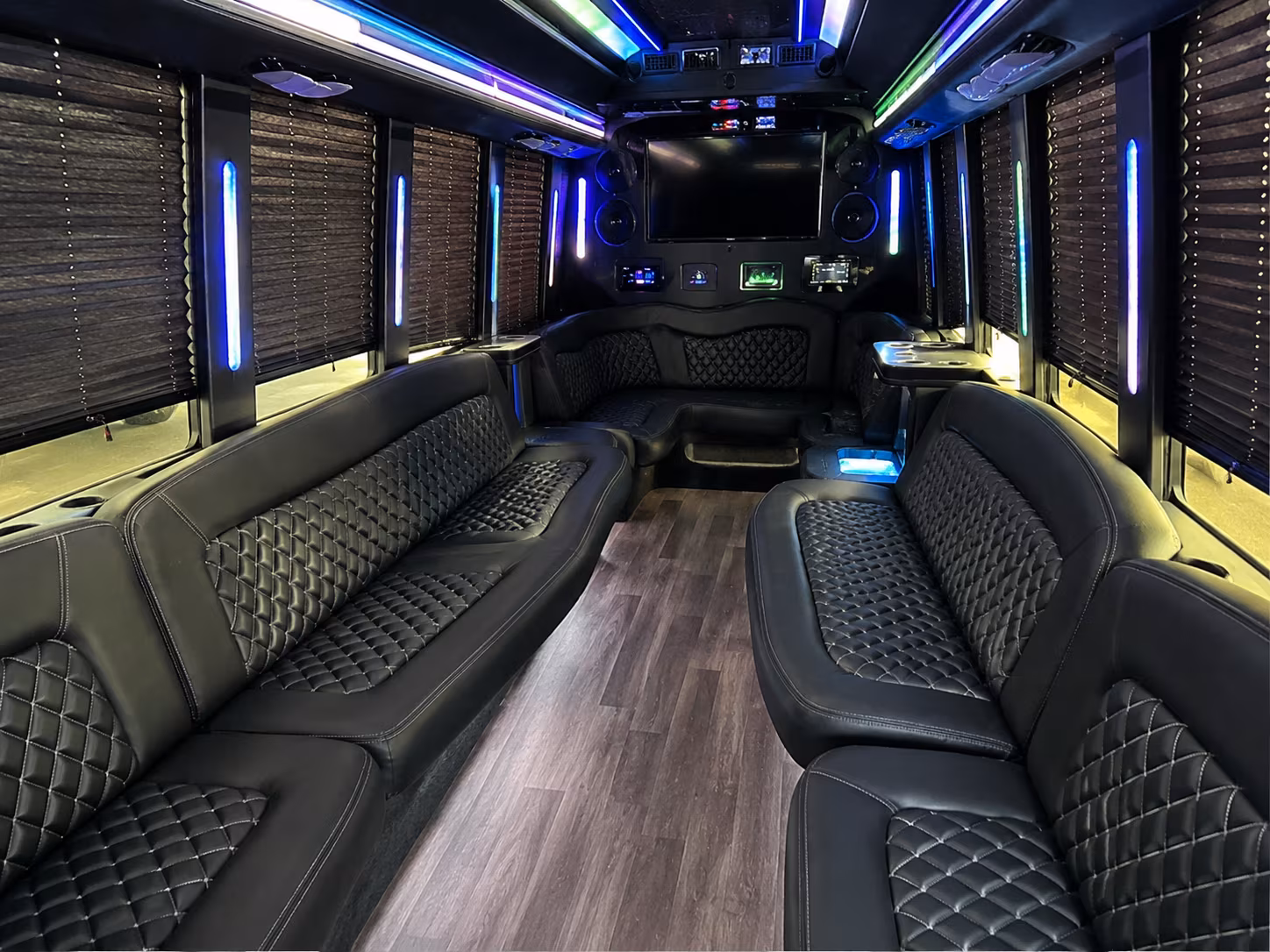 Group beside a Mercedes Sprinter limo in North Charleston
